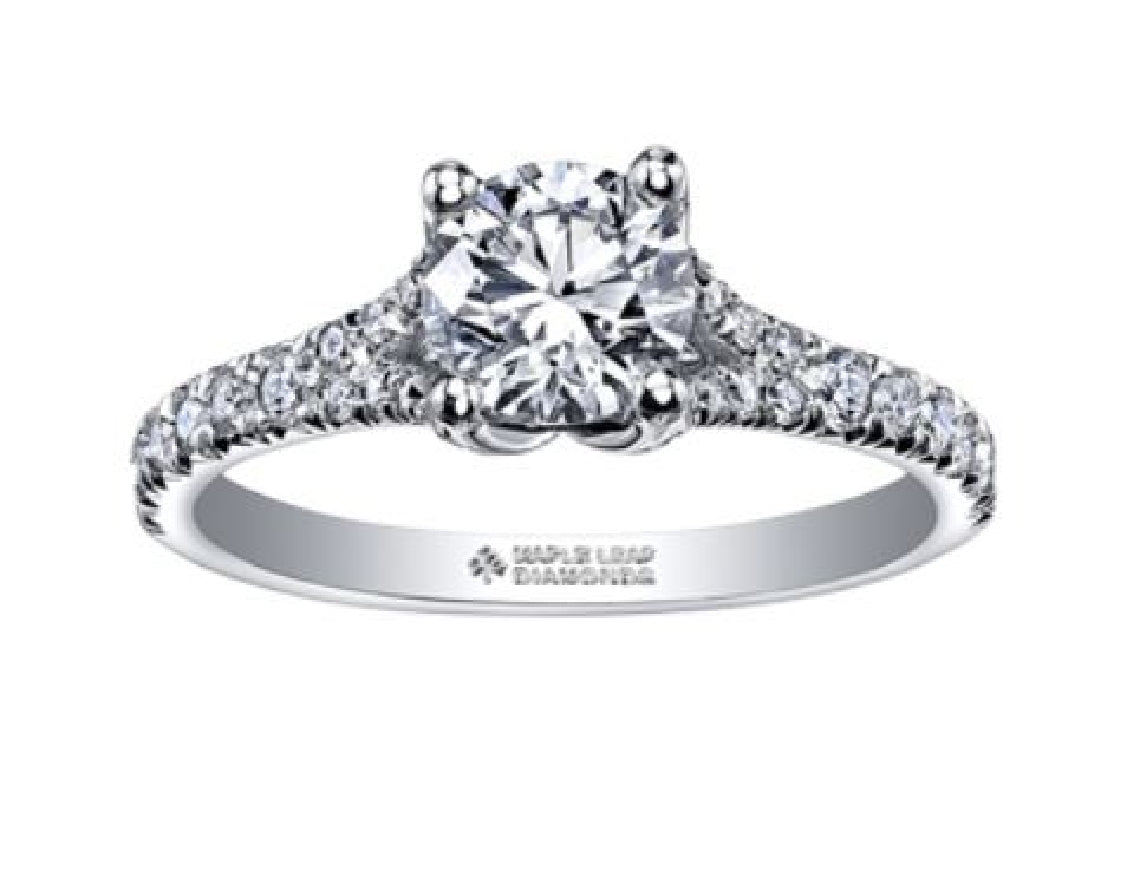 Lady's 18kt white gold MAPLE LEAF DIAMONDS engagement ring set with 1 x 0.50ct round brilliant cut CANADIAN diamond and 24 round brilliant cut diamonds = 0.25ct tw
Total diamond weight = 0.75ct