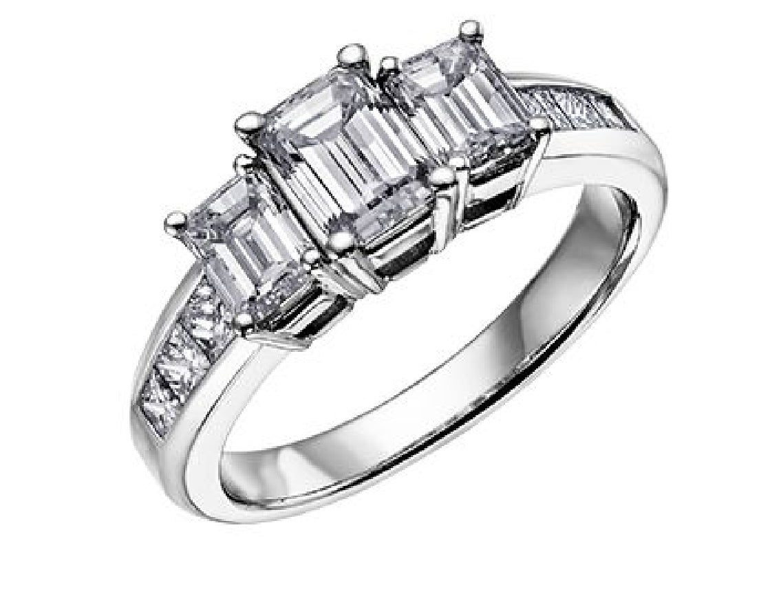 Lady's 18kt white gold MAPLE LEAF DIAMONDS engagement ring set with 1 x 0.35ct emerald cut CANADIAN diamond, 2 x 0.24ct emerald cut CANADIAN diamonds and 6 princess cut diamonds = 0.26ct 
Total diamond weight = 1.09ct