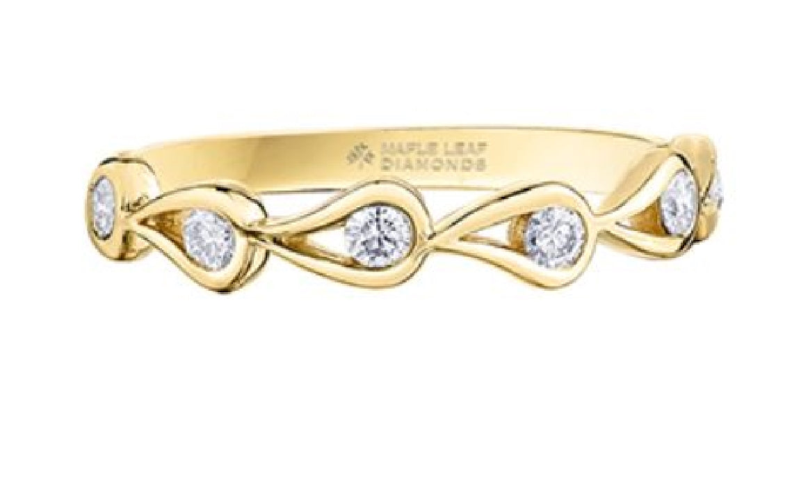 Lady's 14kt yellow gold MAPLE LEAF DIAMONDS dress ring set with 6 round brilliant cut CANADIAN diamonds = 0.24ct tw