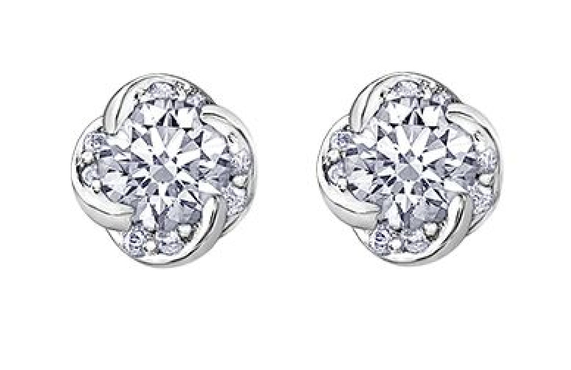 Lady's 18kt white gold MAPLE LEAF DIAMONDS 'Winds Embrace' stud earrings set with 2 round brilliant cut CANADIAN diamonds
= 0.16ct and 16 round brilliant cut diamonds = 0.04ct
Total diamond weight = 0.20ct