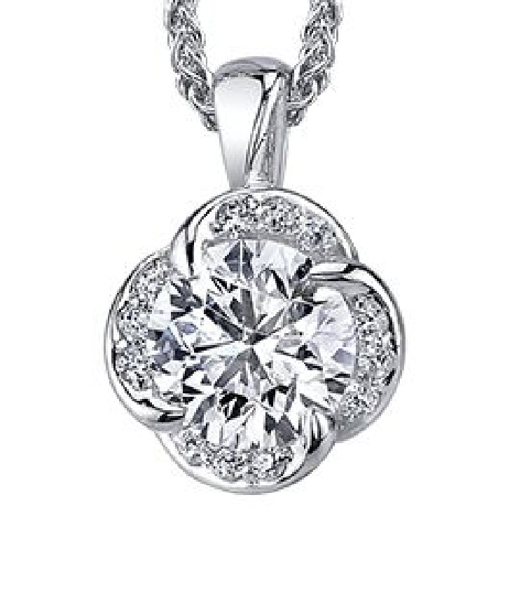 Lady's 18kt white gold MAPLE LEAF DIAMONDS 'Winds Embrace' pendant set with 1 x 0.23ct round brilliant cut CANADIAN diamond
and 8 round brilliant cut diamonds = 0.03ct on a fine link chain
Total diamond weight = 0.26ct
