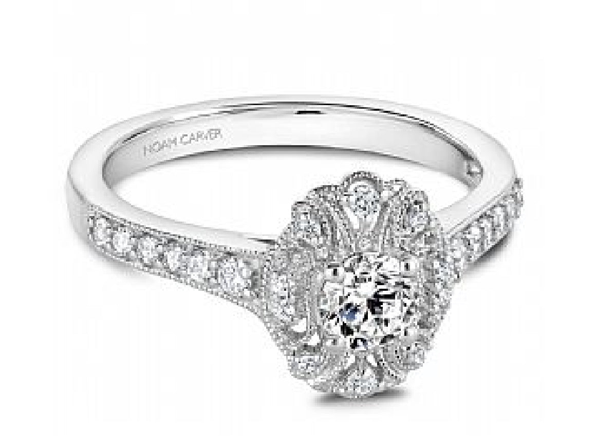 Lady's 14kt white gold NOAM CARVER STUDIO engagement ring set with 1 x 0.33ct round brilliant cut diamond and 28 round brilliant cut diamonds = 0.23ct tw
Ring size = 6.5