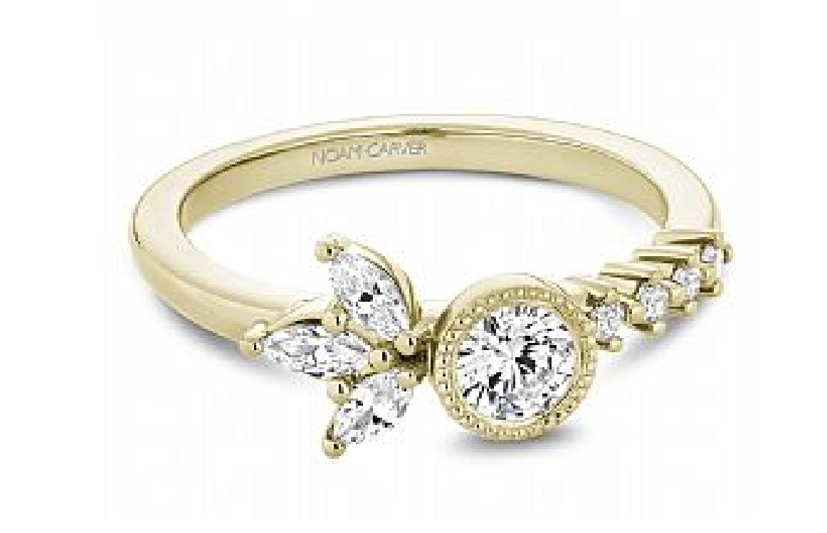 Lady's 14kt yellow gold NOAM CARVER STUDIO engagement ring set with 1 x 0.33ct round brilliant cut diamond, 3 marquise cut diamonds = 0.24ct tw and 4 round brilliant cut diamonds = 0.05ct
Ring size = 6.5